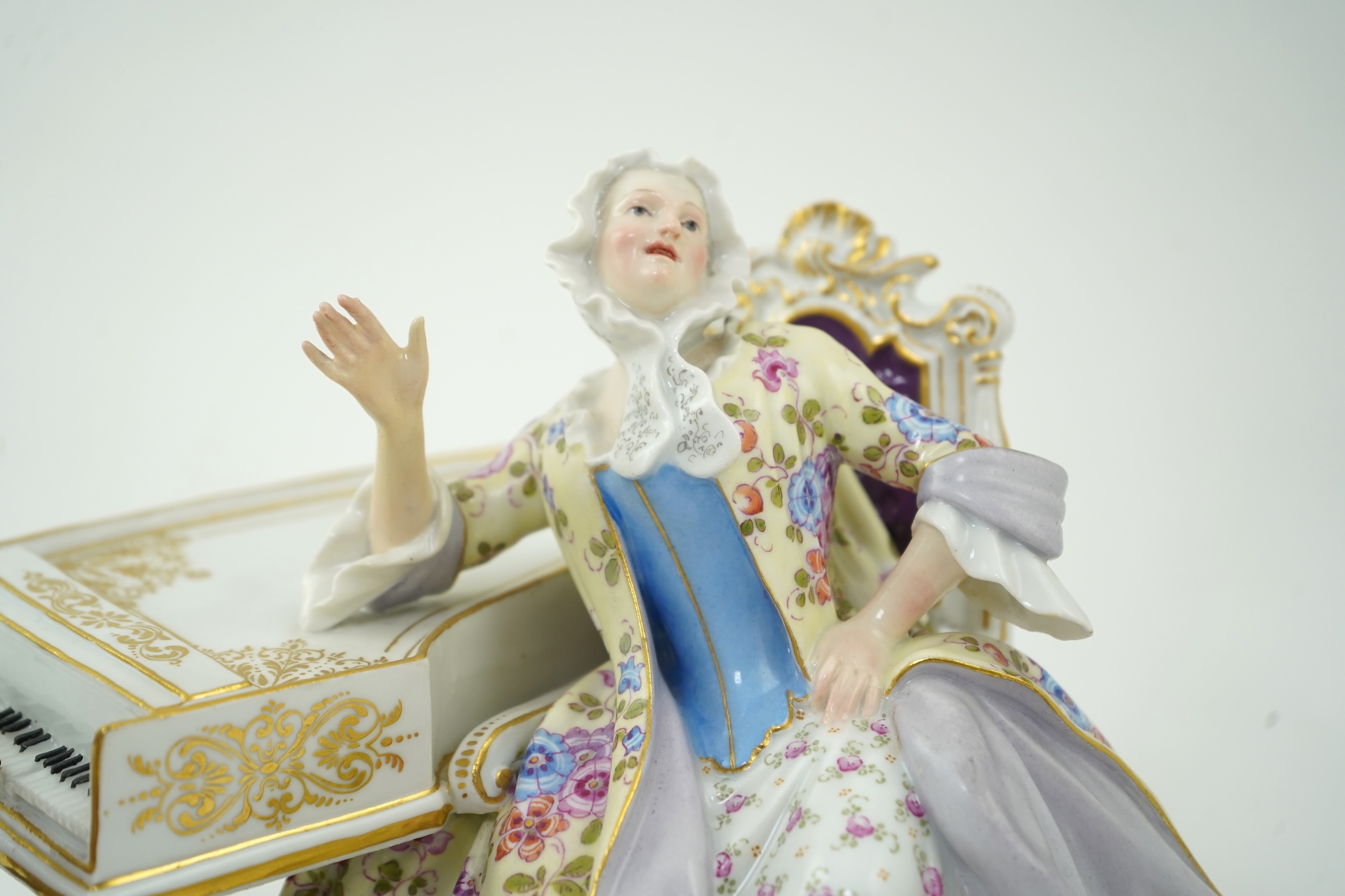 A Meissen group of a fox at the piano and a lady listening, after J. J. Kandler, late 19th century